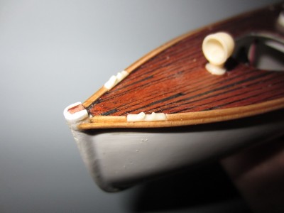 The cast resin deck edge fairleads were fitted into the wood work.