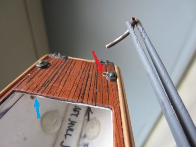 The two copper tubes will carry the rudder control cables.