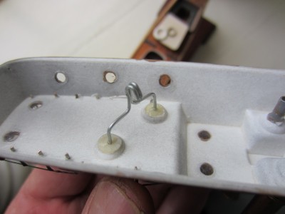 The wire hook, fixed into the underside of the resin ventilator cowls.