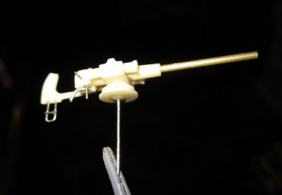 The wire and metal components were added  and the gun was sprayed in primer before painting.