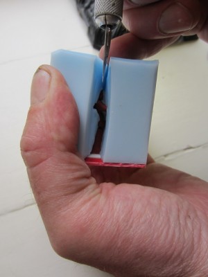 A sharp scalpel was used to split the rubber mould.