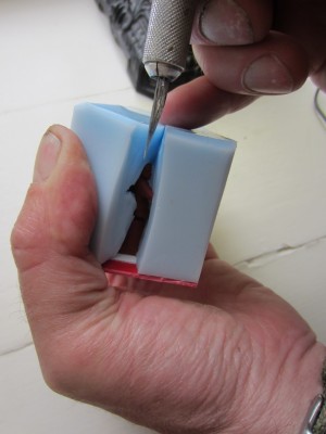 Holding the mould apart while cutting was difficult.