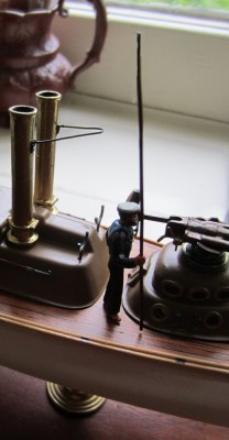 The other figures on the picket boat model were secured in the same way. Here is the sailor with the boat hook on the fore deck.