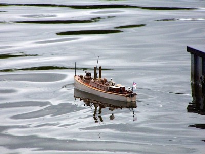 The Little RN picket boat leaves the harbour mouth.
