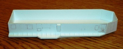 Supporting structure under the overhang is in place as well as the trim around the deck edge.  This was made with .020 x .060 styrene strip.  It was cut to the proper angle using my favorite tool, a common cuticle clipper.