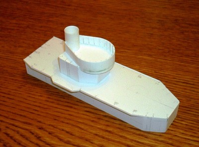 Splinter shield has been installed for the gun director.  It is styrene tubing that has been thinned from the inside for a more scale appearance.  I simply turned a curved Xacto blade inside the tubing to thin the wall.