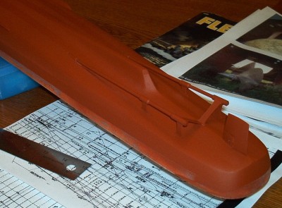 Hull plating, very visible in person but barely visible in the photos (look close!), was achieved by masking and spraying <br />heavier thicknesses of primer for the overlapping plating strakes.